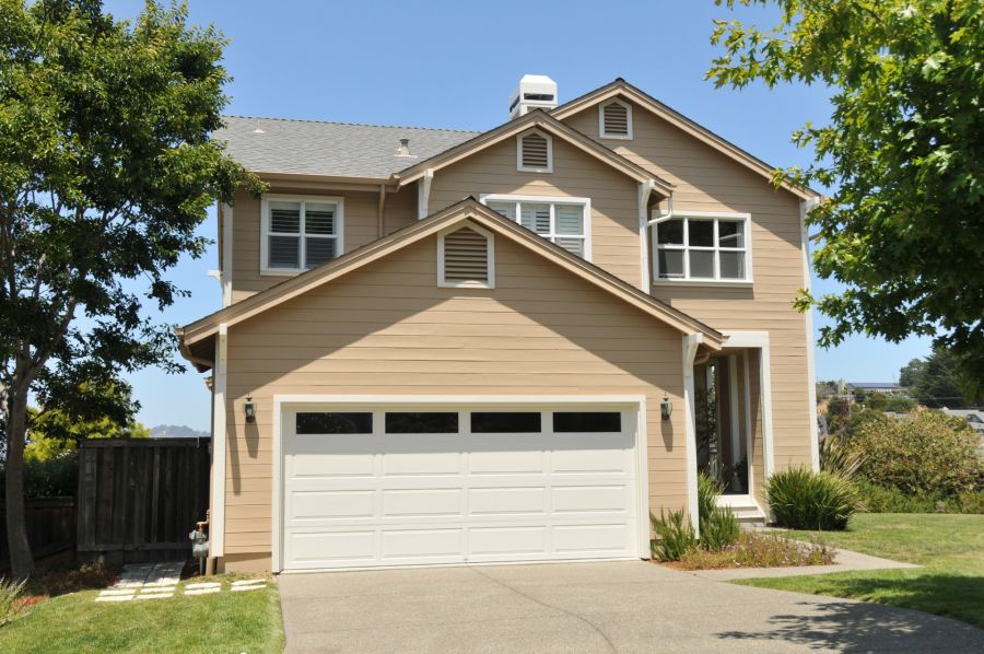 Exterior of house painted blue.